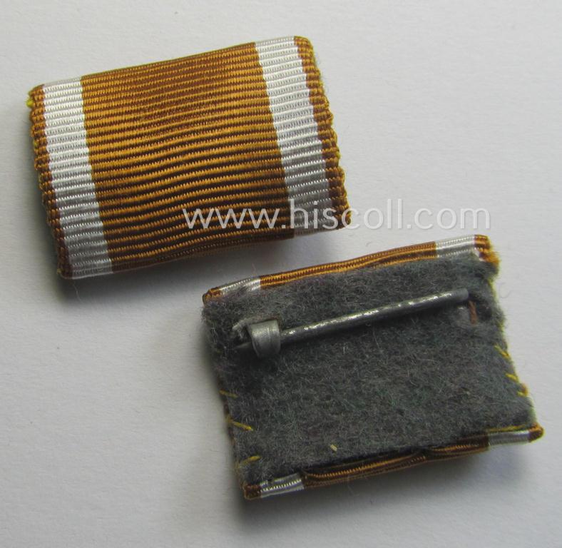 Neat - and simply never issued- nor worn! - single-pieced ribbon-bar (ie. 'Feld- o. Bandspange') as was intended for the: 'Deutsches Schutzwall Ehrenzeichen' (aka: 'Westwall'-medal)