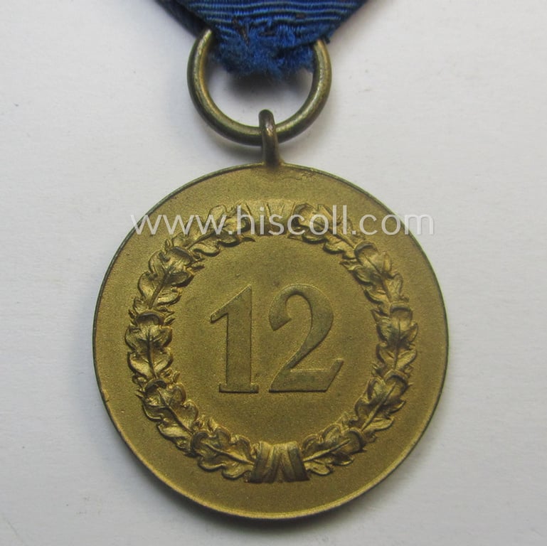 WH (Heeres o. KM) bright golden-toned 'WH-DA der 3. Klasse für 12 Jahre Dienstzeit' that comes mounted onto its accompanying ribbon (ie. 'Bandabschnitt') having a golden-toned eagle-device attached