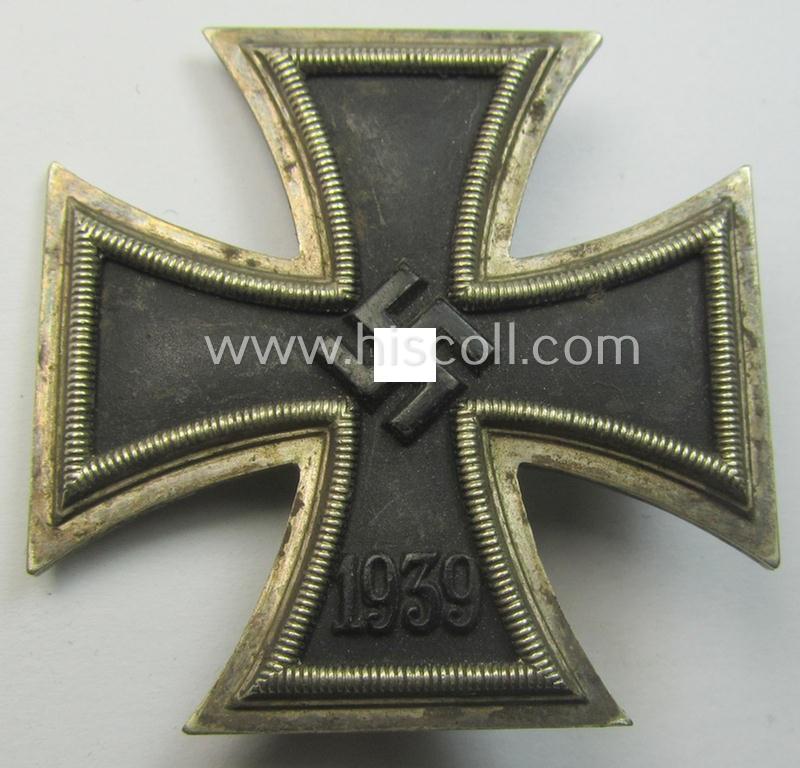 'Eisernes Kreuz 1. Klasse' (ie. Iron Cross 1st class) being an (I deem) early-war-period-produced (albeit non-maker-marked) example by 'K&Q' that comes complete in its specific etui