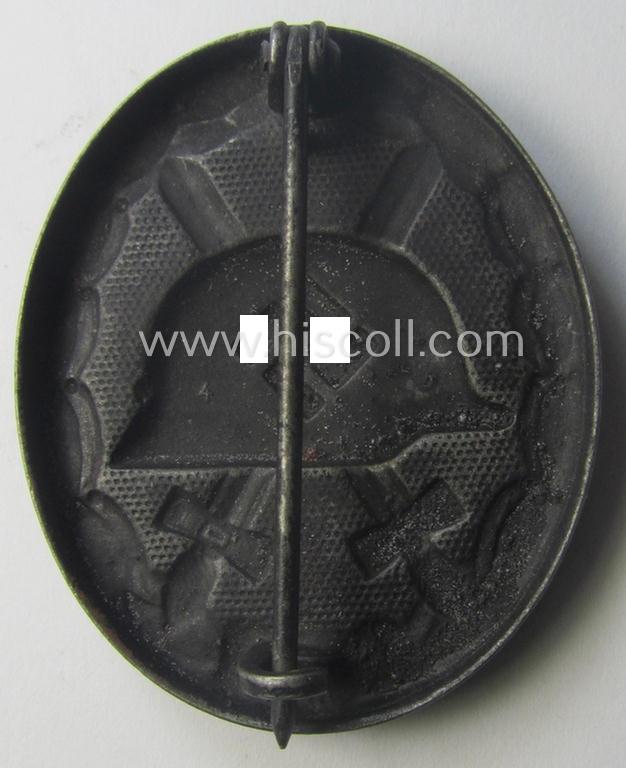 Black-class wound-badge (or: 'Verwundeten-Abzeichen in Schwarz') being a maker- (ie. '4'-) marked specimen as was produced by the maker (ie. 'Hersteller') named: 'Steinhauer & Lück'