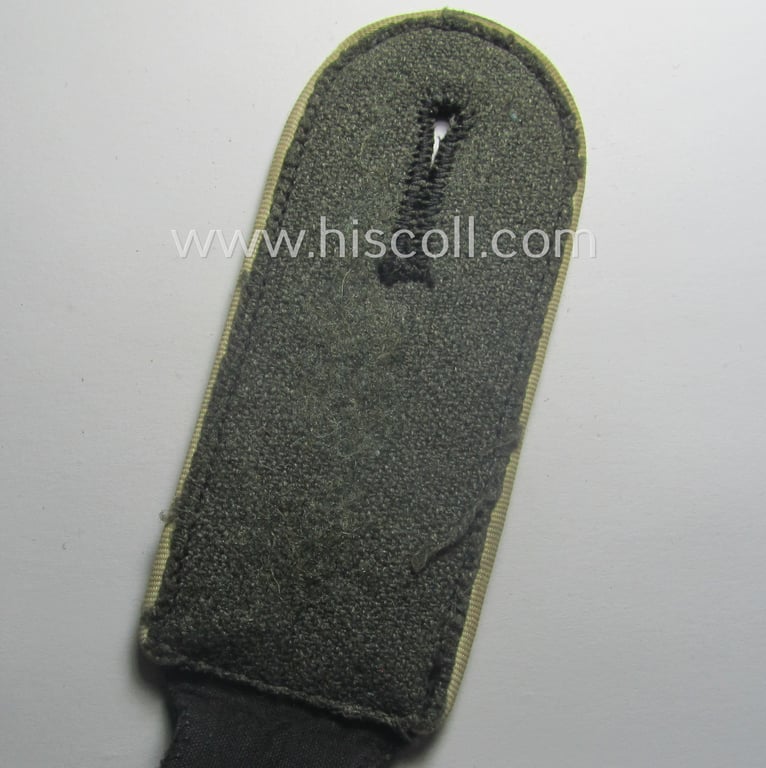 Single, Waffen-SS, EM-type shoulderstrap as piped in the white-coloured branchcolour: 'SS-Mann der Infanterie-Trpn.'