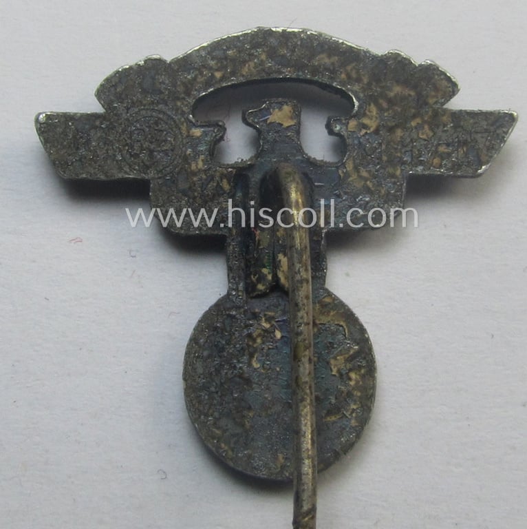 Greyish-silver-toned - and 'aluminium-based - lapel-pin (ie. 'Zivilabzeichen') to be worn on the civil attire as was intended for usage by the various staff-members of the N.S.K.K. (ie. 'National Socialistisches Kraftfahr Korps')