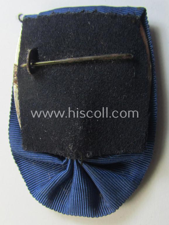 Attractive, silver-toned WH (Heeres o. KM) so-called: 'Einzelspange' showing a: 'WH-Dienstauszeichnung 4. Stufe' (as was intended for 4 years of loyal-service) and that shows a detailed, Heeres o. KM-type-eagle-device, period-attached