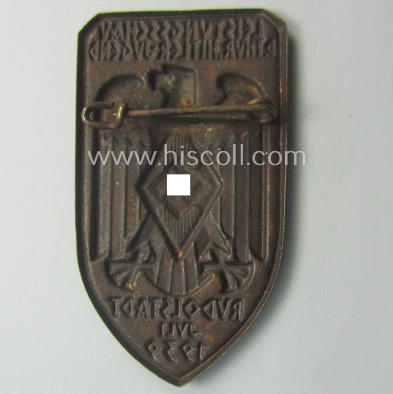 Bronze-toned, HJ- (ie. DJ-) related 'tinnie' (ie. 'Tagungs- o. Veranstaltungsabzeichen') showing a 'Reichsadler'-device, HJ-'Raute' and text that reads: 'Leistungsschau der Thur. Hitler-Jugend - Rudolstadt - Juli 1939'
