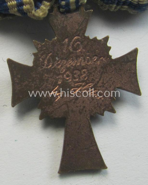 Miniature of an: 'Ehrenkreuz der deutschen Mutter - dritte Stufe' (or: bronze-class mothers'-cross) being a non-maker-marked example that comes in an overall nice- (albeit moderately worn- ie. used-), condition
