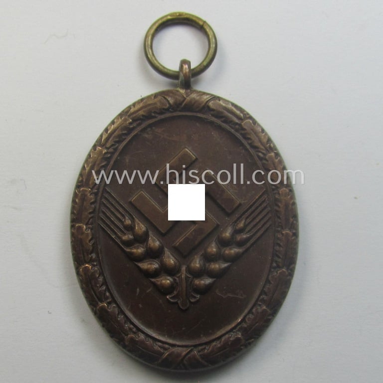 'Reichsarbeitsdienst der weiblichen Jugend' (or: RADwJ) so-called: 'Dienstauszeichnung der 4. Stf. in Bronze' that comes with its period ribbon (ie. 'Bandabschnitt')