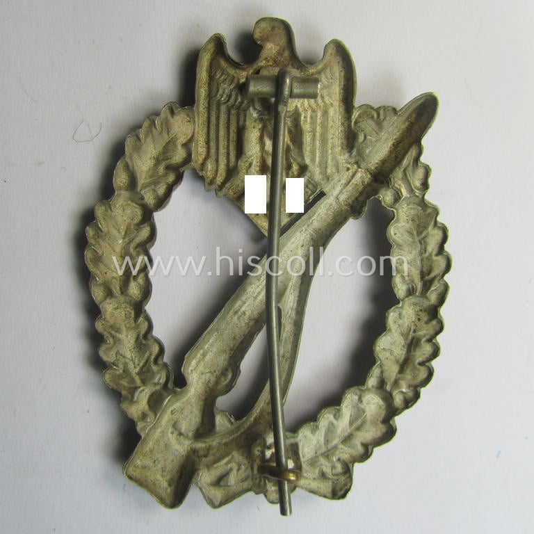'Infanterie Sturmabzeichen in Silber' (or: silver-class infantry-assault-badge ie. IAB) being a 'Buntmetall'-based example by the: 'Otto Schickle'-company