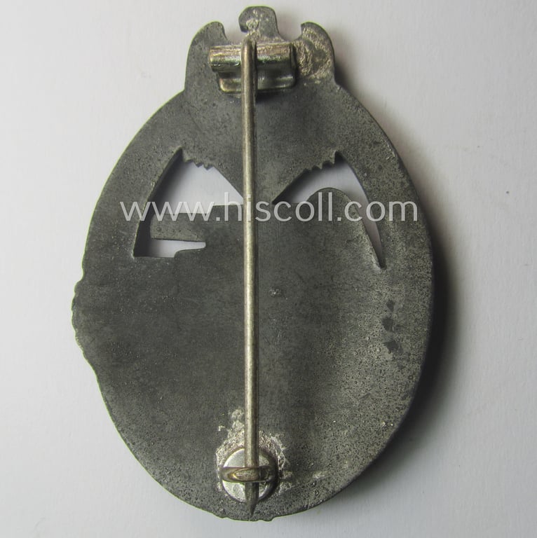 'Panzerkampfabzeichen in Silber' (or: silver-class panzer-assault badge or PAB) being a typical non-maker-marked- and/or zinc- (ie. 'Feinzink'-) based specimen of the so-called: 'scooped flatback'-pattern