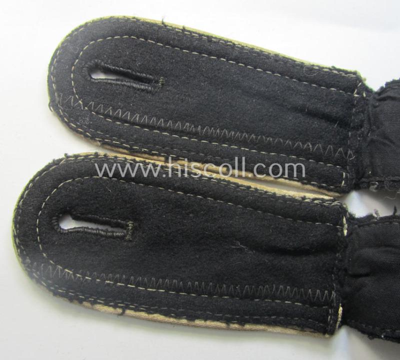 Pair of Waffen-SS NCO-type shoulderstraps as piped in the white-coloured branchcolour as was intended for usage by an: 'SS-Unterscharführer' who served within the: 'Waffen-SS Infanterie-Trpn.'