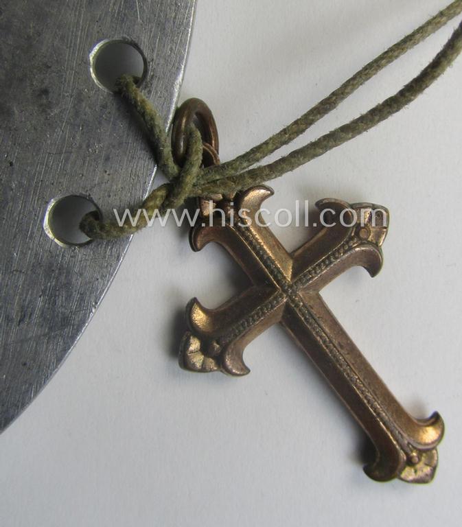 Zinc-based WH (Heeres) 'Heeres-Flak'- ie. 'GrossDeutschland-Division'-related ID-disc bearing the clearly stamped unit-designation that reads: '3./H.FlakArt.Abt. G.D.' and that comes mounted onto its period cord as worn