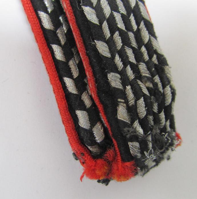 Attractive - and almost matching - pair of N.S.K.K. (or: 'National Socialistisches Kraftfahr Korps') shoulderboards as piped in the bright-red coloured branchcolour, as was intended for usage by the Dutch NSKK-volunteers