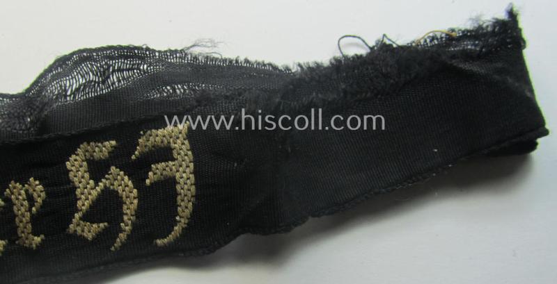 Truly worn (ie. relic) example) of the - actually scarcely encountered! - HJ ('Hitlerjugend') armband (ie. cuff-title) as woven in the neat 'BeVo'-like-pattern, entitled: 'Landdienst der HJ'