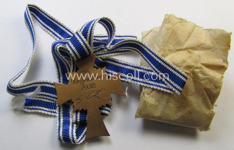 'Ehrenkreuz der Deutschen Mutter - Dritte Stufe' that comes in a 'virtually mint- ie. unissued', condition