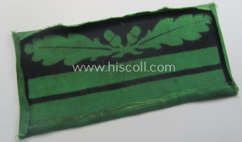 Moderately used - albeit regrettably single! - officers'-pattern, WH (Heeres o. Waffen-SS) rank-insignia-bar (for usage on the camouflaged-uniforms) as used by an officer holding the rank of: 'Oberleutnant' (ie.: 'SS-Obersturmführer')