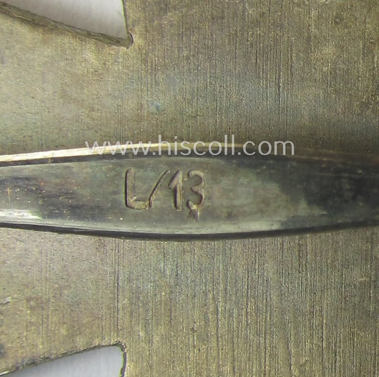 'Eisernes Kreuz 1. Kl.' (or: Iron Cross 1st class) being a (typical) maker- (ie. 'L/13'-) marked example as was produced by the maker (ie. 'Hersteller'): 'Paul Meybauer' and that comes in its original etui as issued