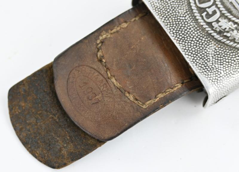 German WH Beltbuckle with leather tab 'B. Haarmann'