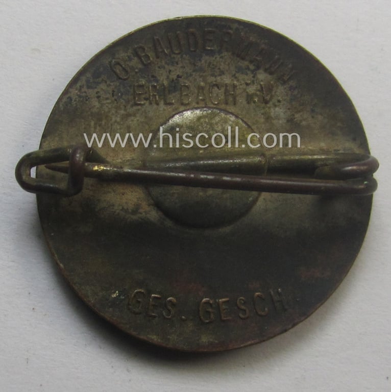 Multi-coloured enamelled, 'Mitgliedsabzeichen' as intended to signify membership within the: 'HJ' (or: 'Hitlerjugend') before June 1932 (being of the 1st pattern that shows a clearly present makers'-designation: 'O. Baudermann - Erlbach i.V.')
