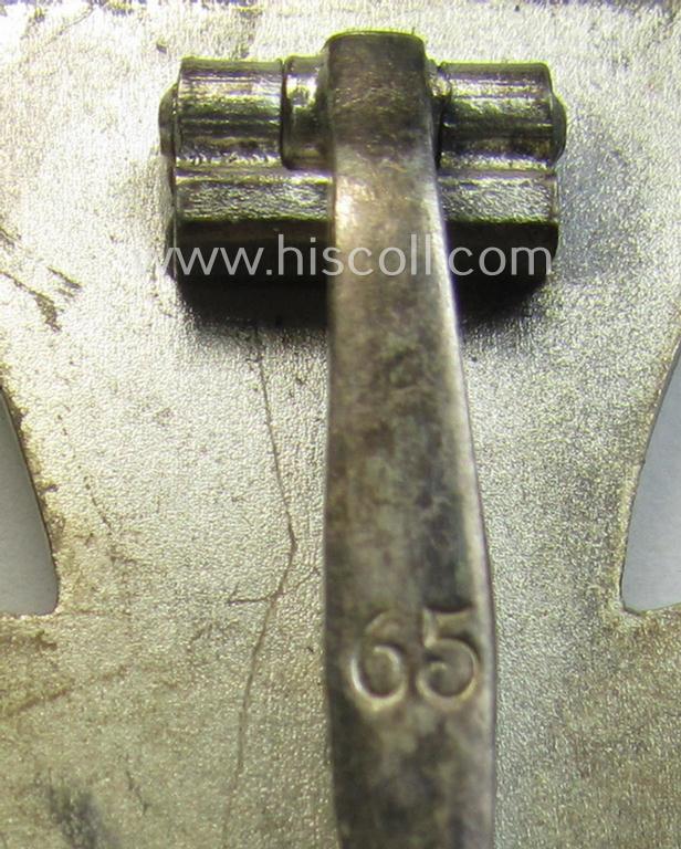 'Eisernes Kreuz 1. Klasse' (or: Iron Cross 1st class) being a typical maker- (ie. '65'-) marked example that was produced by the desirable 'Hersteller' named: 'Klein & Quenzer A.G.'