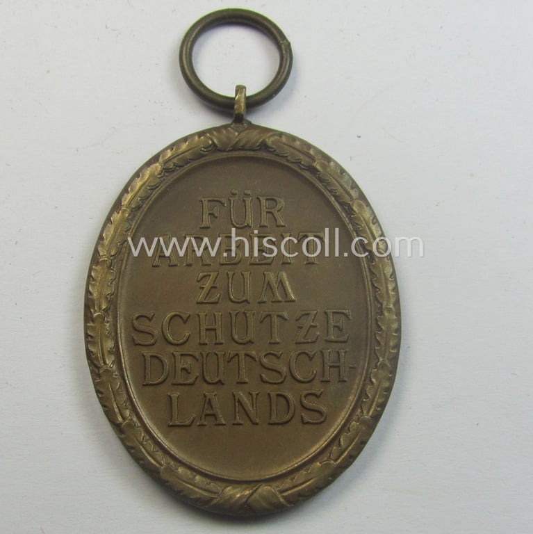 Medal-set: 'Deutsches Schutzwall Ehrenzeichen' (aka: 'Westwall'-medal) being a non-maker-marked- and/or: 'Buntmetall'-based specimen