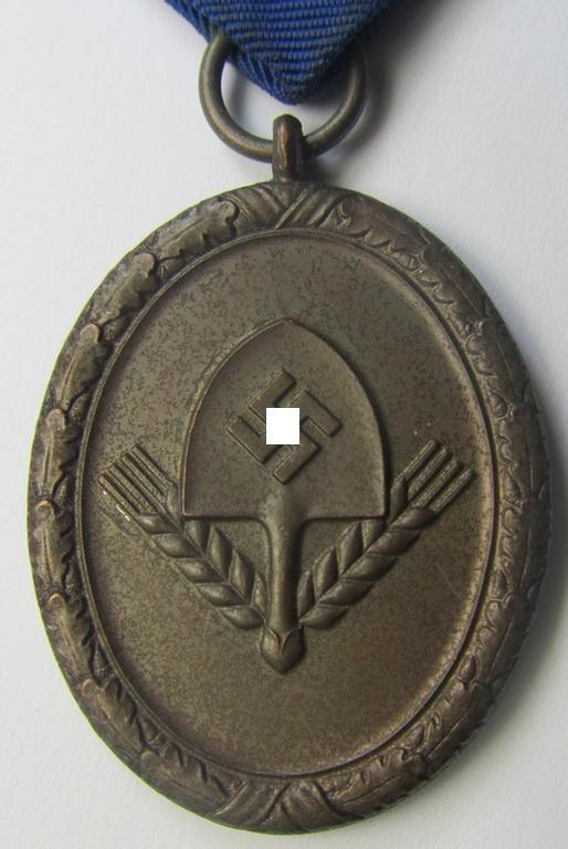RAD (ie. 'Reichsarbeitsdienst'): 'Dienstauszeichnung 4. Stufe für Männer' as was intended for 4 years loyal-service and that comes mounted onto its period (broad-sized) ribbon (ie. 'Bandabschnitt')
