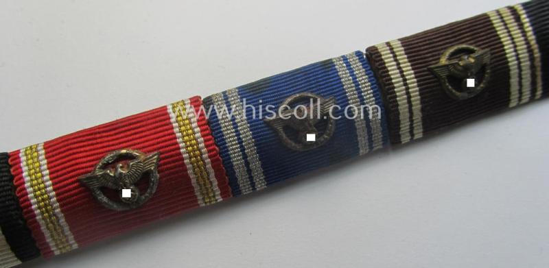 6-pieced WWI- (ie. WWII-) period ribbon-bar (ie. 'Feld- o. Bandspange') showing repsp. an: 'EKII. Kl.', a: 'FKK m. S.', three N.S.D.A.P.-'Dienstauszeichnungen' (with 'Auflagen') and a: Czech 'Anschluss'-medal with 'PB-Spange'-miniature