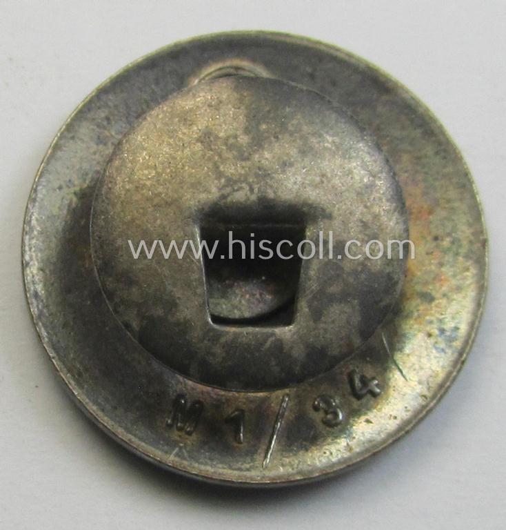 Neatly enamelled- (and bright-red-coloured!) 'N.S.D.A.P.'-membership-pin- ie. party-badge (or: 'Parteiabzeichen') which is nicely maker-marked on the back with the makers'-designation: 'RzM' and/or: 'M1/34'