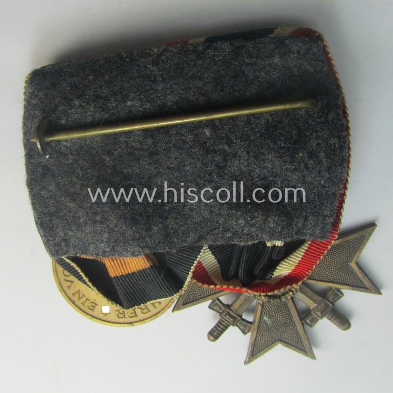 Moderately used, two-pieced medal-bar (ie.: 'Orden- o. Doppelspange') resp. showing a: 'KvK 2. Klasse mit Schw.' and a WH Czech 'Anschluss'-medal: '1. Oktober 1938'