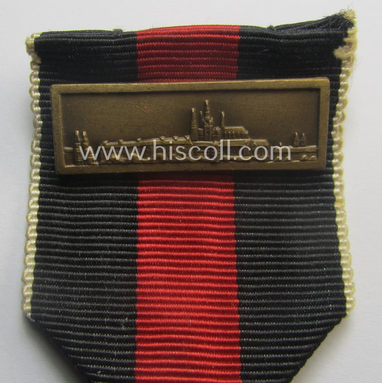 WH Czech-occupation- (ie. 'Anschluss'-) medal: '1. Oktober 1938' that comes mounted onto its period ribbon and that shows a firmly (and period!) attached 'Prager Burg-Spange'