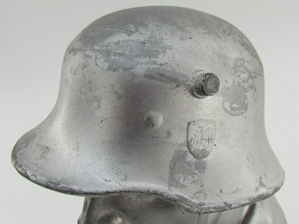 “German Wehrmacht soldier bust desk decoration on marble base.”