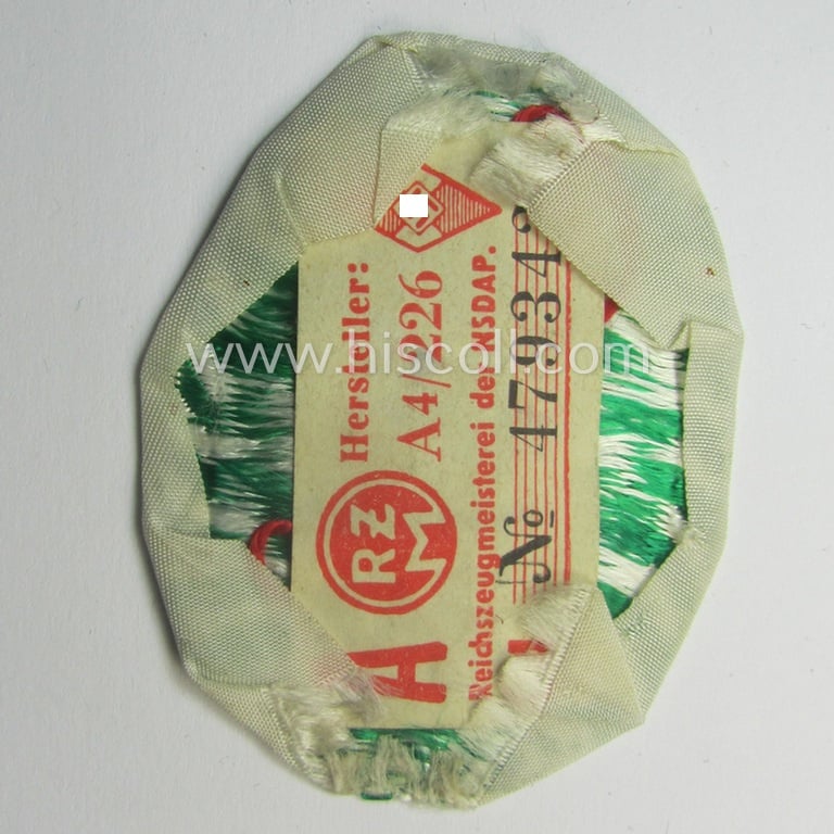 HJ/BDM (ie. 'Hitlerjugend'/'Bund Deutscher Mädel') trade- ie. specialist-armbadge as executed in neat 'BeVo'-weave pattern as was specifically intended for a: 'Gefolgschaftsfeldscher' that still retains its 'RzM'-etiket