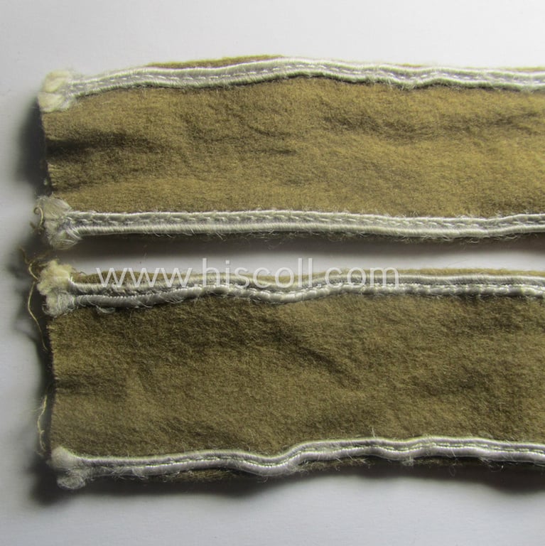 WH (LW o. Heeres) cuff-title (ie. 'Ärmelstreifen') entitled: 'Afrika' (being an example that comes in a presumably issued- albeit simply never used- ie. 'virtually mint' condition)