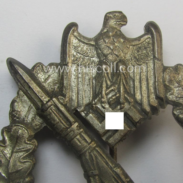 Attractive, 'Infanterie Sturmabzeichen in Silber' (or: silver-class infantry assault-badge ie. IAB) being a maker- (ie. 'ÜÜ'- ie. 'E.F. Wiedmann') marked so-called: 'Lily Pad-hinge'-example that comes stored in its period box