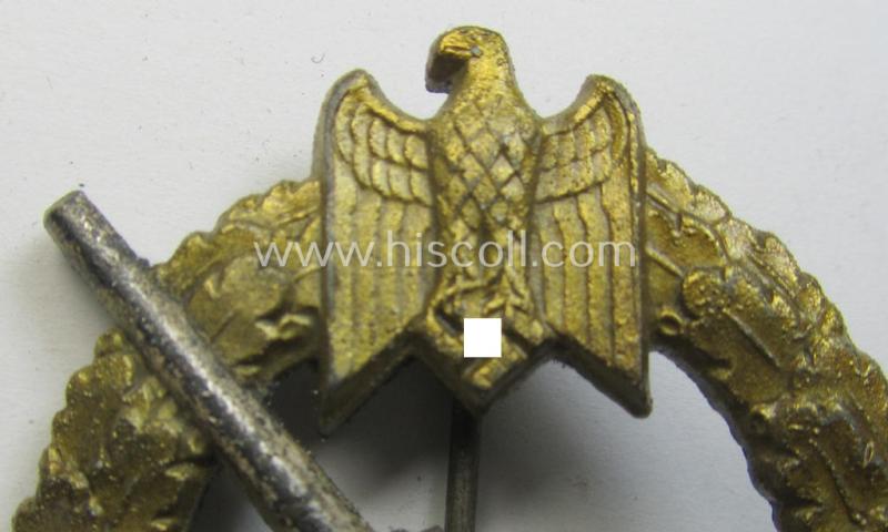 WH (KM) 'Marine-Artillerie-Abzeichen' being a maker- (ie. 'F.L.L. - 43'-) marked- and/or zinc- (ie. 'Feinzink'-) based example by the: 'Friedrich Linden'-company