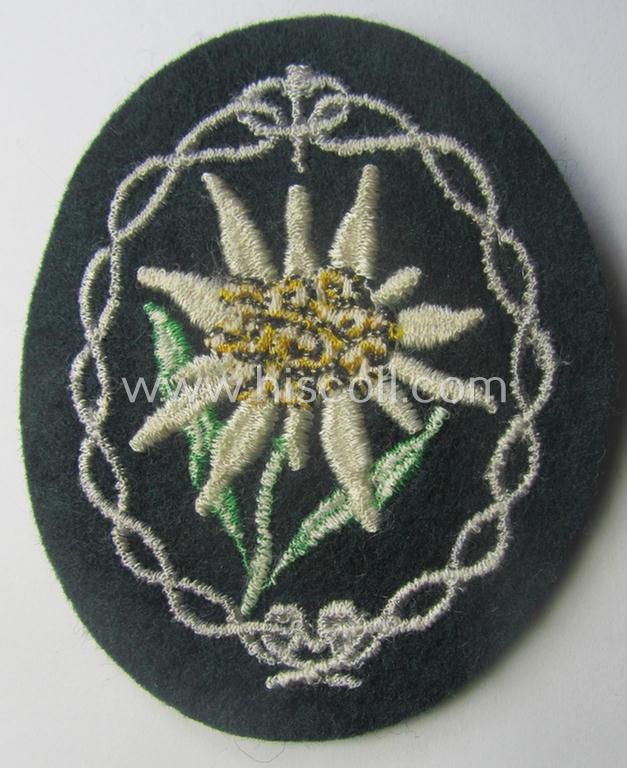 WH (Heeres) EM- (ie. NCO-) type: 'Edelweiss'-armpatch (being a machine-embroidered specimen)