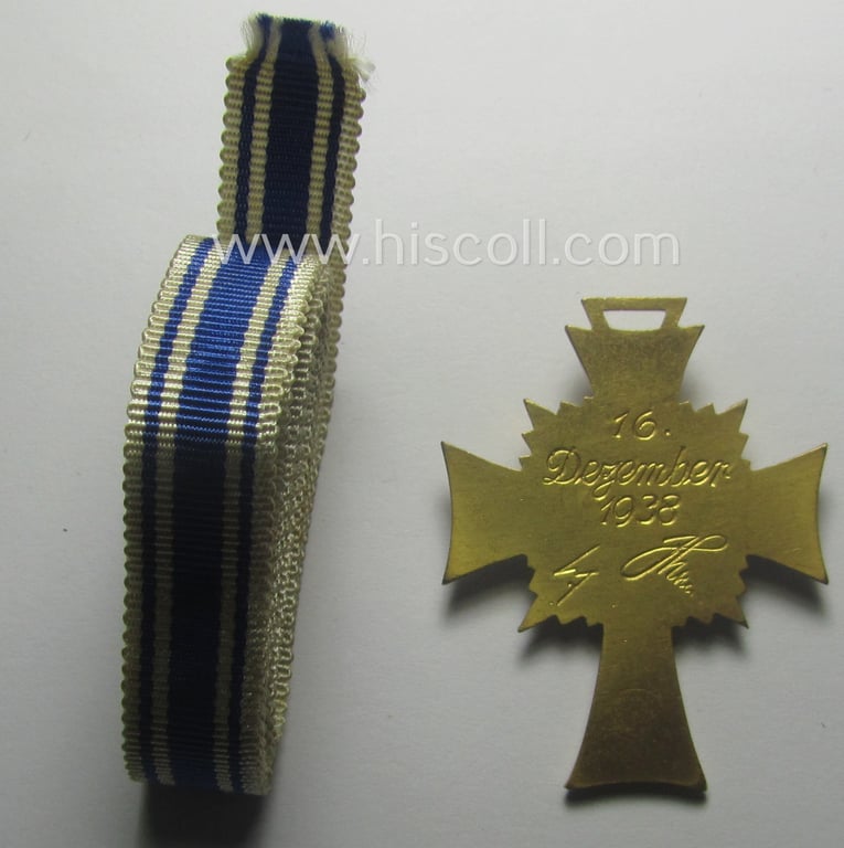 'Ehrenkreuz der deutschen Mutter - erste Stufe' (or: golden-class mothers'-cross) being a 'virtually mint' example that comes with its accompanying, long-sized ribbon as issued and/or recently found