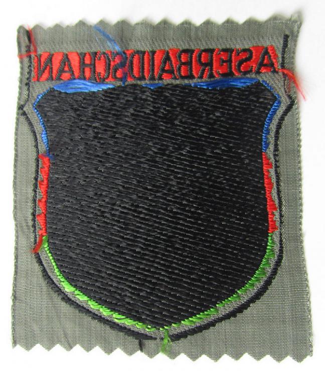 Neat, 'BeVo'-type armshield entitled: 'Aserbaidschan', being a piece as intended for a volunteer who served within the 'Deutsche Wehrmacht' ie. within the 'Aserbaidschanisches Legion'