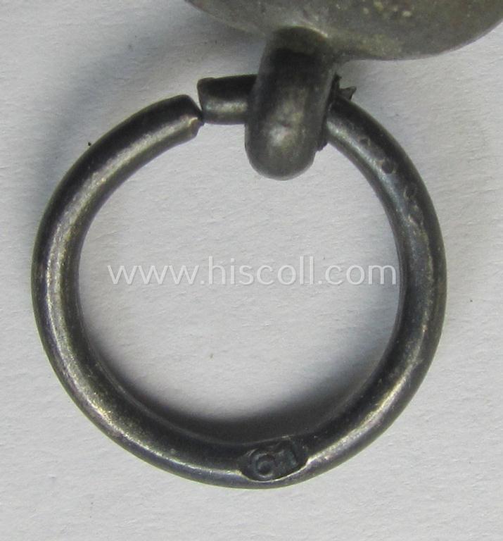 Attractive medal-set: 'Winterschlacht im Osten 1941-42' being a maker- (ie. '61'-) marked- (and/or 'Feinzink'-based) specimen by the maker: 'R.A. Karneth & Söhne' and that comes together with its (non-confectioned) ribbon (ie. 'Bandabschnitt...