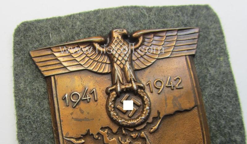 WH (Heeres ie. Waffen-SS) 'Krim'-campaign-shield (by the maker: 'Friedrich Orth') that comes stored in its period (and rarely seen!) 'Zellstoff'-based pouch and that comes in a probably issued- (albeit still 'virtually mint'-), condition