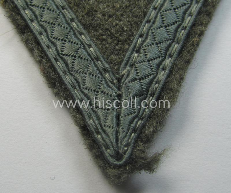 WH (Heeres) 'Armwinkel' (or: arm-chevron) as executed on typical field-grey-coloured wool as was specifically intended for usage by a soldier with the rank of: 'Gefreiter'