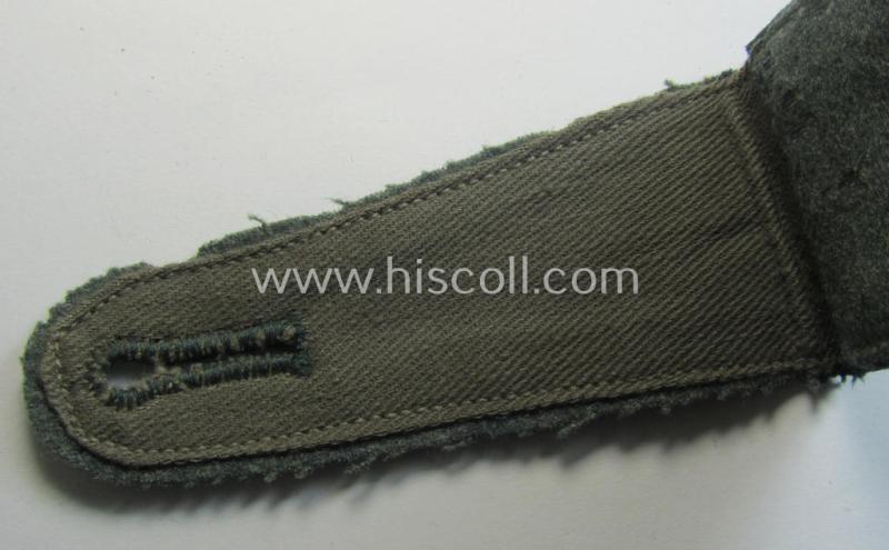 Single - and actually not that often seen! - WH (Heeres) EM-type (ie. 'M36-/M40'-pattern- and 'pointed styled-') 'cyphered' shoulderstrap as was intended for usage by a: 'Soldat des Artillerie-Regiments 34'