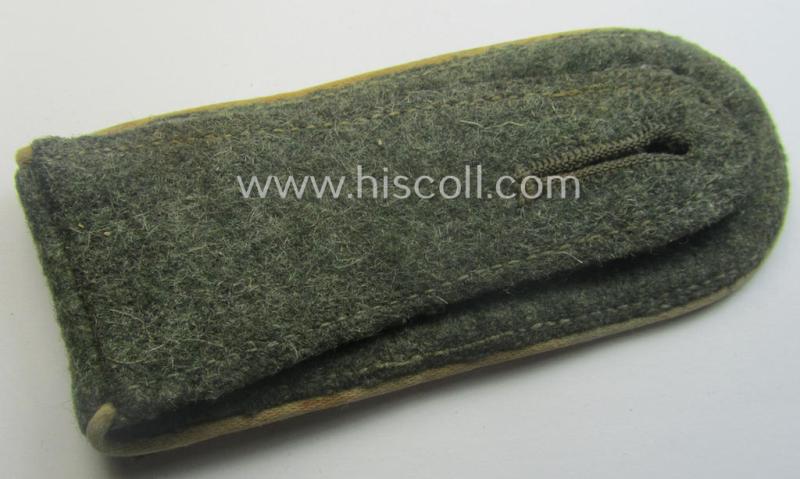 Single, WH (Heeres) NCO-type (ie. 'M40'- ie. 'M43'-pattern) shoulderstrap having the white-coloured branchcolour as was intended for - and clearly worn by! - a: 'Oberfeldwebel der Infanterie-Trpn.'