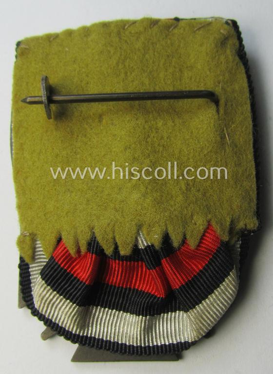 Neat, golden-bronze-toned so-called: 'Einzelspange' showing a: 'Frontkämpferkreuz 1914-18 mit Schwertern' (ie.: 'Kriegsteilnehmerkreuz 1914-18 mit Schw.') being a detailed- and/or zinc- ie. 'Feinzink'-based, specimen