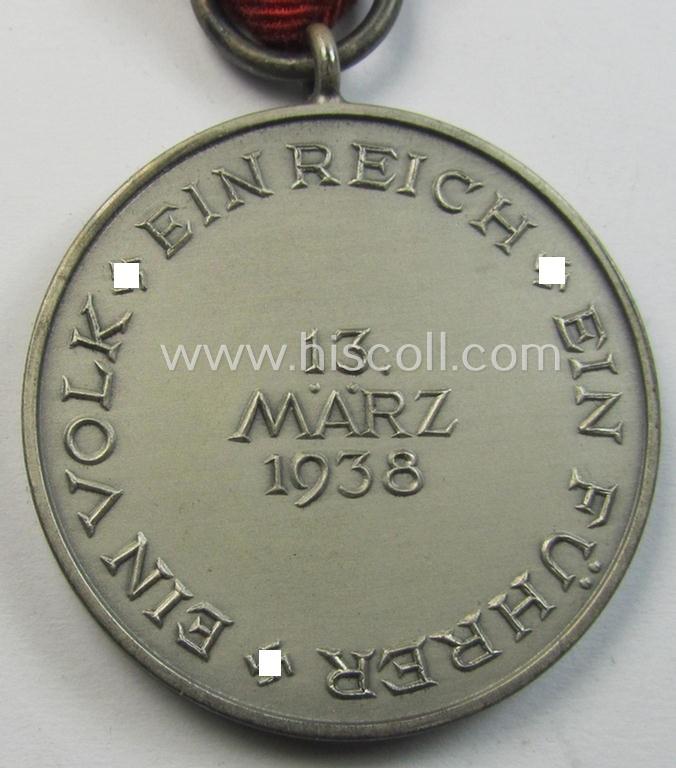 Attractive, WH Austrian-occupation- (ie. 'Anschluss'-) medal: '1. März 1938' being an attractive (and hardly tarnished) example that comes stored in its bright-red-coloured- and/or typical non-maker-marked etui as issued