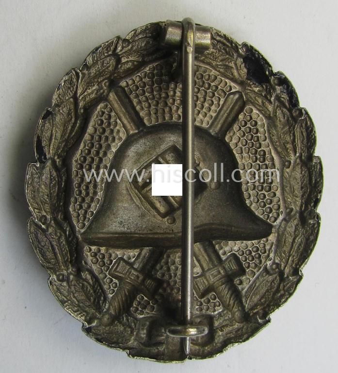 Attractive, early-pattern, black-class wound-badge (ie.: 'Verwundeten Abzeichen in Schwarz') being a detailed so-called: 'Spanish Civil-War'-version that comes in a moderately used- and/or worn, condition