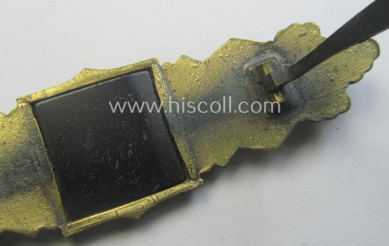 'Nahkampfspange in Bronze' (or: bronze-class close-combat clasp ie. CCC) being a maker- (ie. 'F.&B.-L.'-) marked- and/or minimally converse-shaped specimen as was produced by the maker- (ie. 'Hersteller') 'Funcke u. Brüninghaus'