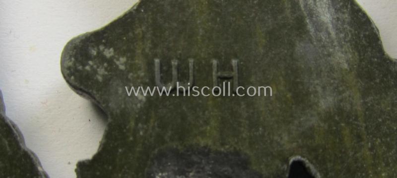 Later-war period- and/or: zinc- (ie. 'Feinzink'-) based- example of a maker- (ie. 'WH'-) marked, WH (Luftwaffe) 'Flakkampfabzeichen' (or: airforce anti-aircraft badge), as was produced by the desirable: 'Wilhelm Hobacher'-company