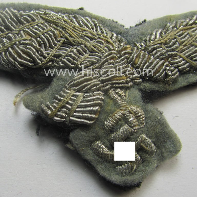 WH (Luftwaffe) officers'-pattern breast-eagle (ie. 'Brustadler für Offiziere der Luftwaffe') being a neatly hand-embroidered example of the: 'Extra Qualität' that comes in a truly used- (ie. carefully tunic-removed-), condition