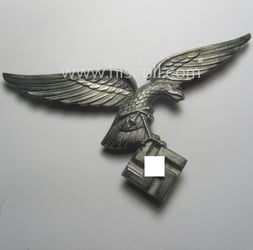Attractive, silver-coloured- (and/or I deem tin-based), WH (Luftwaffe)...