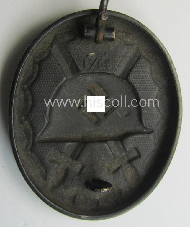 Maker- (ie. 'L/56'-) marked example of a black-class wound-badge (or: 'Verwundeten-Abzeichen in Schwarz') being an example by the maker (ie. 'Hersteller') named: 'Funcke & Brüninghaus'