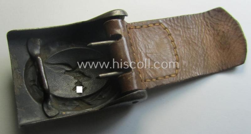 WH (Luftwaffe) bluish-grey-coloured, steel-based belt-buckle being a maker- (ie. 'R. Sieper & Söhne'-) marked example that comes mounted onto its leather-based tab